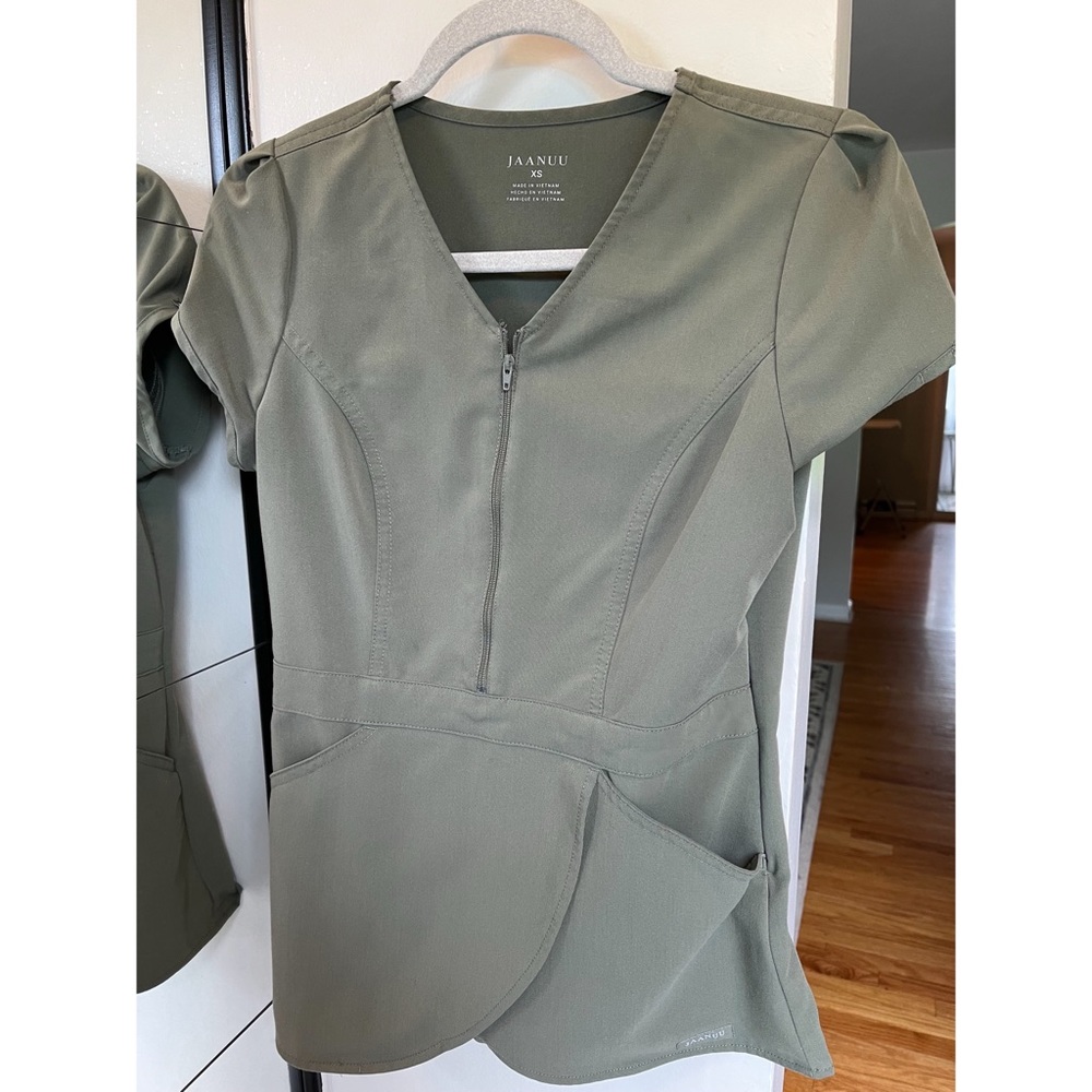 Jaanuu peplum scrub top